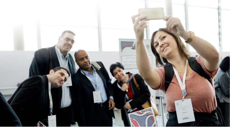 Group of attendees posing for photo at a Euretina Congress, image links to "Membership" page.